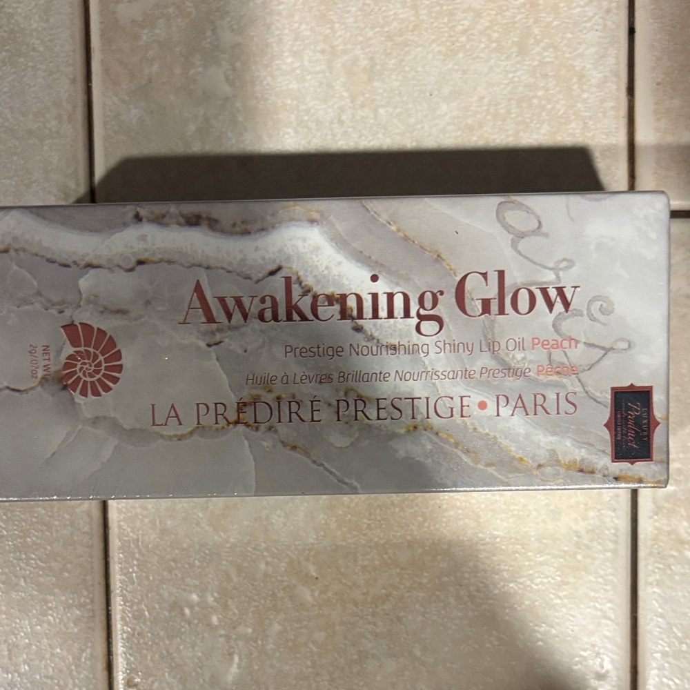 Awakening La Predire Glow Lip Oil peach